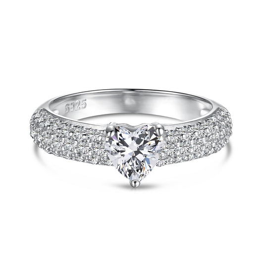 "Love's Luster: Silver Heart Zirconia Affection Ring"