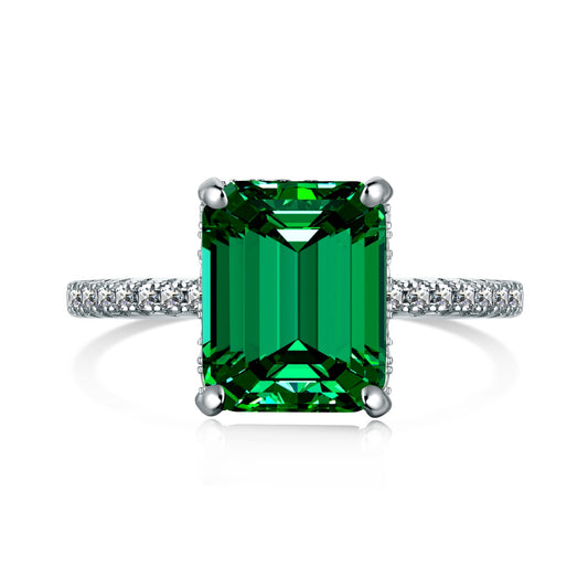 "Tranquil Harmony: Silver Solitaire with Green Zirconia"