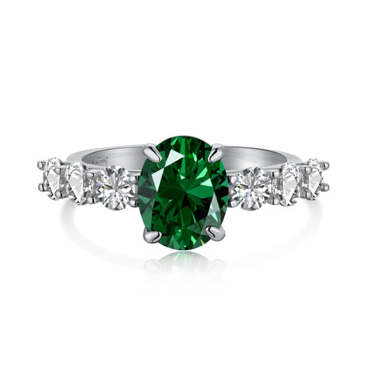 "Emerald Elegance: Classic Chic Zirconia-Encrusted Silver Ring in Emerald Green" 